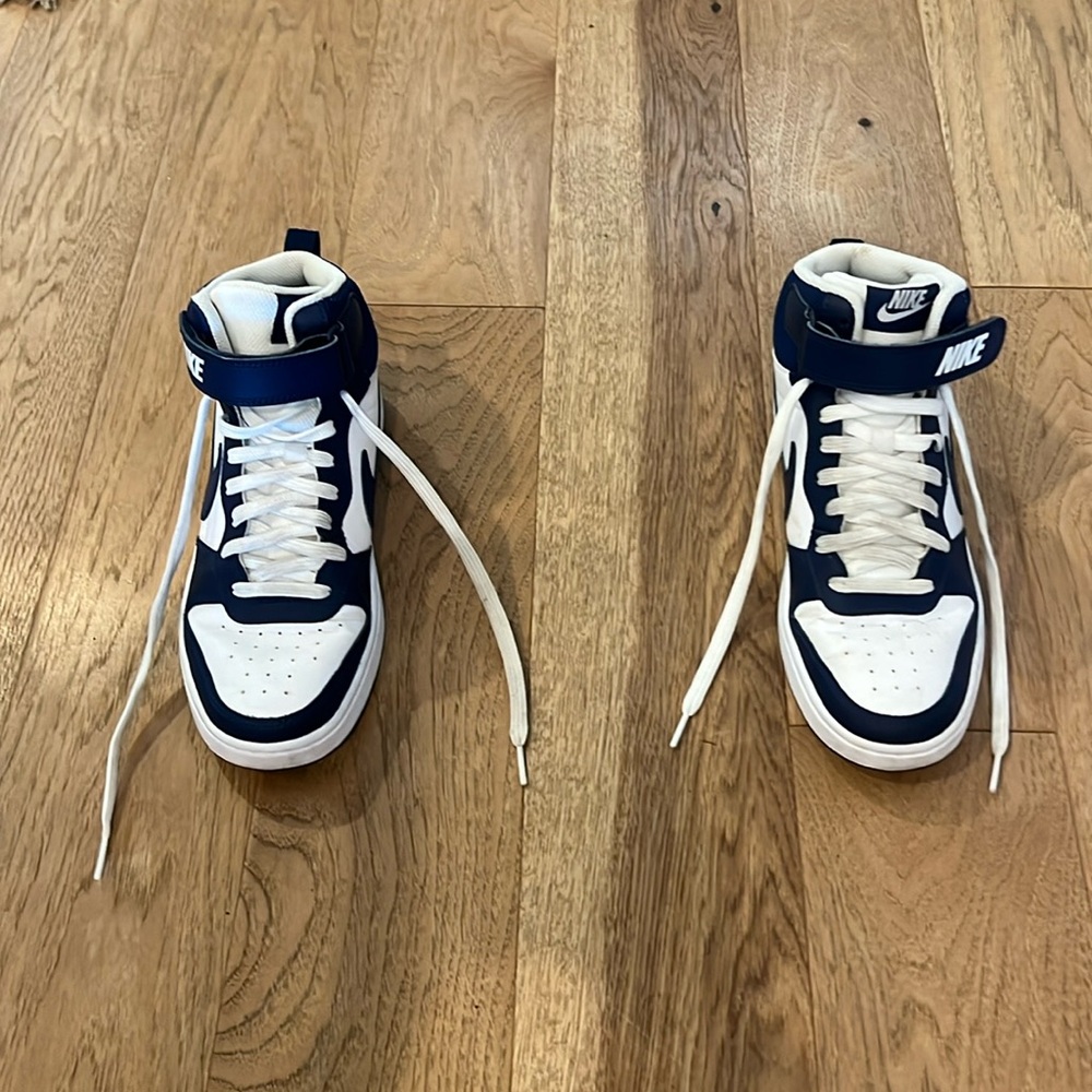 Blue and white Nike shoes